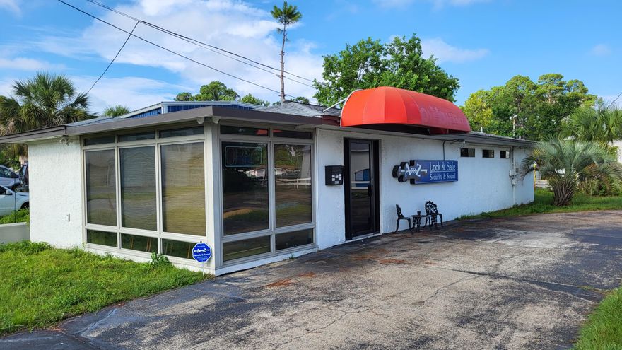 Small freestanding building on SWC of Front Beach Rd and Dorothy Ave in Panama City Beach, FL.  Has waiting area, 5 small offices, break room, storage area, 3 restrooms with one shower.  Used as medical office at one time and last used as a locksmith business.  Looks like there was a room used for x-rays at one time.  Ideal uses are medical, veterinary, beauty salon or spa, insurance, car lot, etc...   Paved parking.  Existing pylon sign at road.