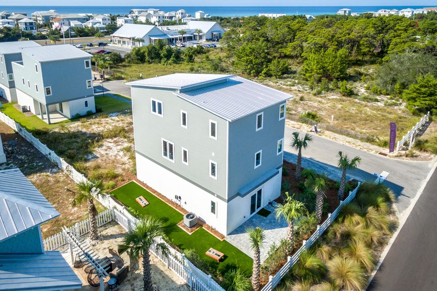 BRING YOUR BUYERS AND YOUR OFFERS! GULF VIEWS AT AN UNBEILEIVABLE PRICE and new interior paint! This contemporary 4 bedroom, 4 full bath home is perched on the highest elevation in Inlet Beach offering GULF VIEWS from the second and third floor! The first level of this Gulf View home features an oversized two car garage as well as a private children's bedroom with sitting area, full bath and an outdoor patio. The second level includes the living, dining and kitchen areas, a huge bedroom, full bath and a covered deck for entertaining. The third level includes the master suite, an additional bedroom and full bath as well as a large deck providing fabulous GULF VIEWS . Hardwood and tile floors,, quartz countertops and stainless appliances finish out this outstanding property.