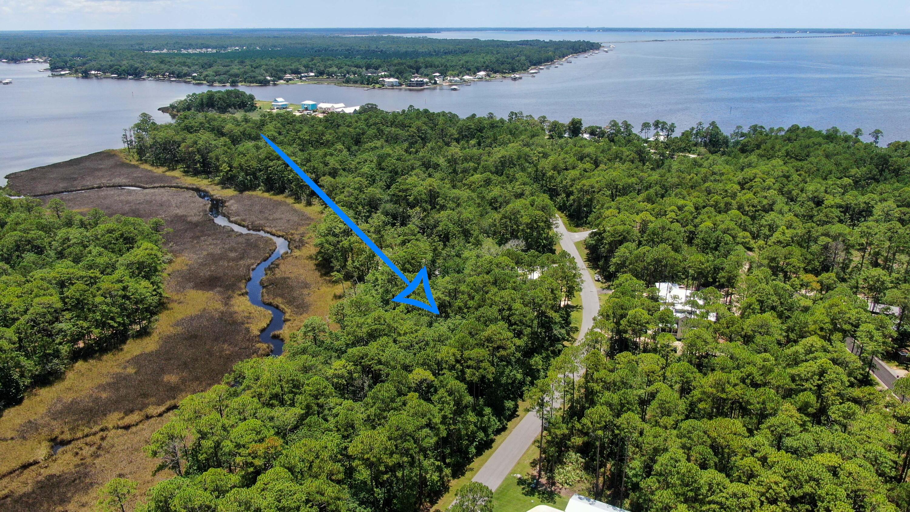 Beautiful buildable lot in the community of Cross Creek Shores. Lot features underground utilities, paved county road frontage and no active HOA. The lot is centrally located off of East Bay Loop with easy access to Bluewater Bay and Destin.