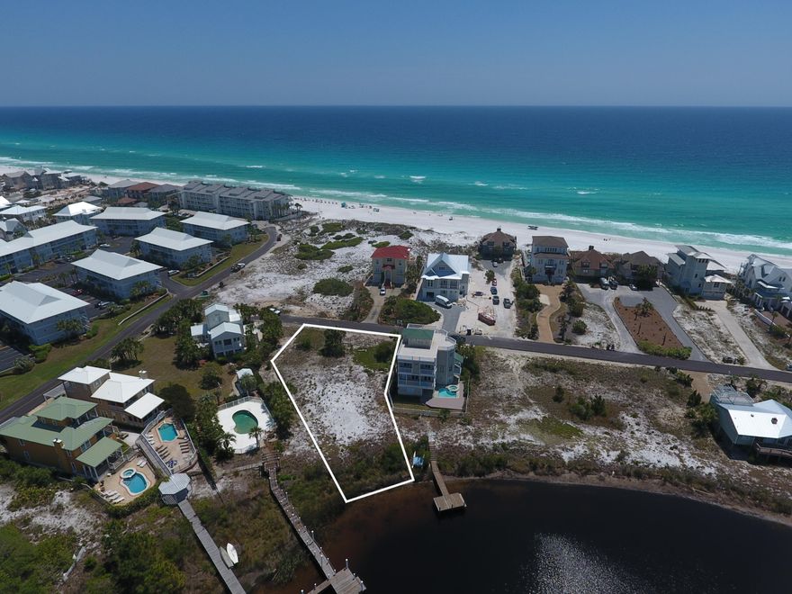 PRIME LAKEFRONT LOT WITH GULF VIEWS priced to sell! Recent comparable Eastern Lakefront lot located further from the beach sold for 775K. This premium lot, located in Seagrove Beach on prominent San Roy Rd, is a rare building opportunity on the southern shore of Eastern Lake. This lot not only will have great water views of the coastal dune lake, but will provide expansive Gulf views from the southern view. This lot allows for the building up to 50 feet in height and a sizable building area. This waterfront lot, just two lots off the Gulf of Mexico, is just steps to the beach and allows for a unique building site for both the end-user, or the wise-investor.