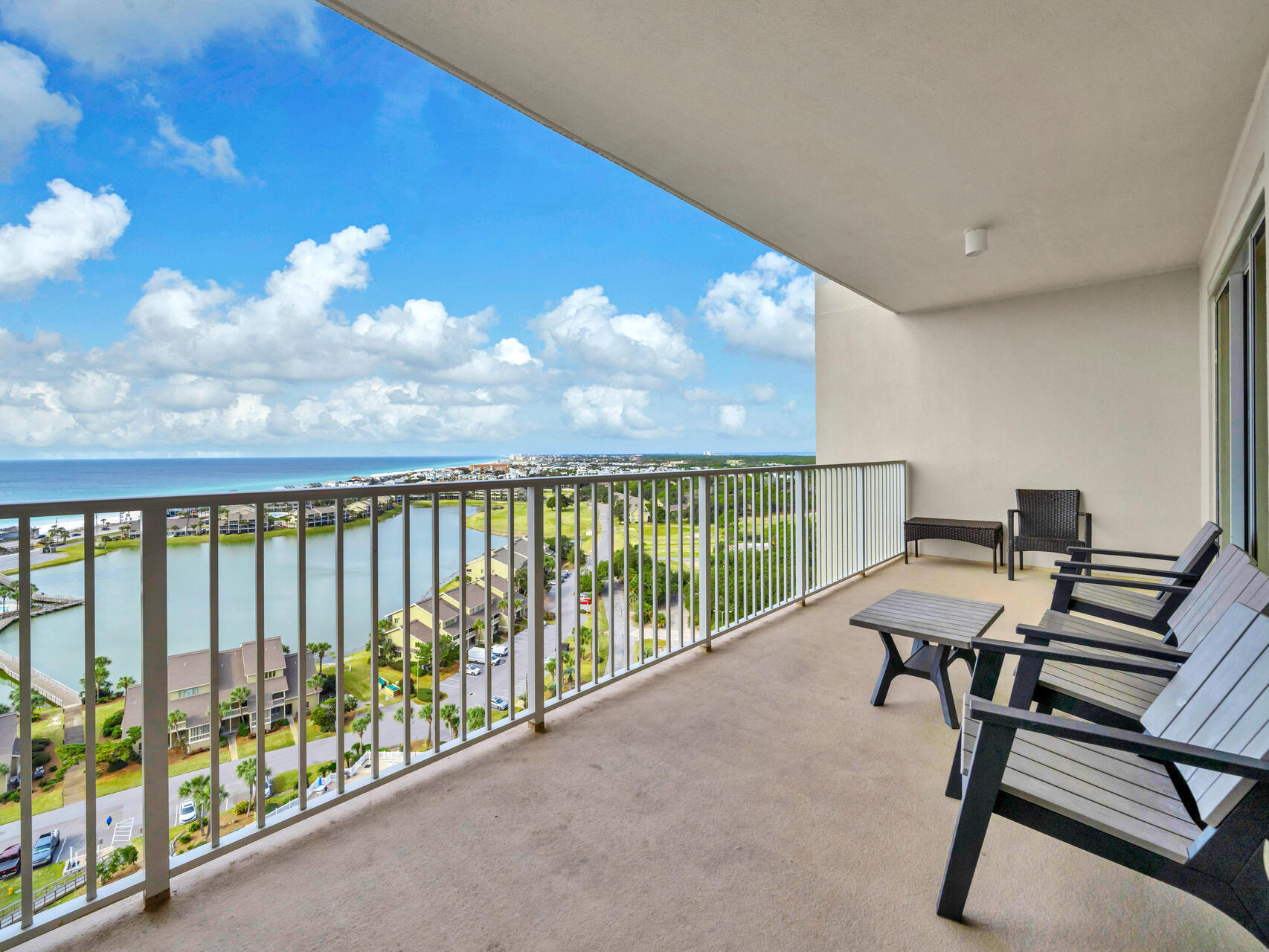 Stunning 16th-floor condo in the private and gated beach community of Ariel Dunes II w/ 2,000ft of private beach!  Enjoy breathtaking Gulf, bay, and lake views from your private balcony. This completely remodeled luxury condo will be one your friends, family and guests will NEVER forget! Featuring new furniture, new flooring, and custom finishes - it's truly the best! The extensive kitchen remodel showcases endless granite countertops, deep farmhouse sink, SS appliances, custom backsplash, beautiful cabinetry + more. The master suite offers private balcony entrance, Gulf /Lake views and a private bathroom with an extended walk-in shower with dual shower heads. A guest room with a queen bed and twin bunk bed, plus a sleeper sofa in the living room, comfortably sleeps 6.  In-unit laundry! The unit also has a private storage closet located outside the unit. Some of the major renovation details - Master Bathroom:
The entire master bathroom underwent a complete redesign to enhance both style and functionality. The original tub was replaced with a spacious walk-in shower, equipped with dual shower heads for a luxurious experience. A new double-sink vanity was installed, paired with a separate custom vanity area for added convenience and organization. Additional updates include a modern toilet, upgraded faucets, sleek lighting, and contemporary mirrors to complement the fresh design.

Secondary Bathroom:
This bathroom received a full renovation, including the installation of a new tub and a stylish tile surround. A modern bathroom vanity with an updated sink and faucet was added, along with a new toilet, contemporary lighting, and an elegant mirror to complete the look.

Kitchen:
The kitchen was completely transformed to meet the demands of modern living. The countertop was lowered to improve accessibility and functionality. A new farmhouse sink and faucet were installed, paired with beautiful granite countertops that provide both style and durability. High-end appliances were also incorporated to enhance the kitchen's overall aesthetic and performance.

Laundry Room:
The laundry room now features a new washer and dryer, along with custom-built shelves that offer additional storage space and organizational solutions. The overall design ensures a practical yet stylish space.

Flooring:
Throughout the condo, luxury vinyl plank flooring was installed, providing the timeless appearance of wood while offering the durability and low-maintenance benefits of modern materials. This flooring choice enhances the condo's appeal and is perfect for everyday living.

Paint:
The condo's main areas are painted in Sherwin Williams' "Grey Screen," a versatile and sophisticated neutral tone. The bedrooms feature a soothing shade of Sherwin Williams' "Sea Salt," creating a calm and serene atmosphere for rest and relaxation.

Finishes:
Every detail was considered, including the replacement of all door knobs and hinges with modern, stylish hardware. These updated finishes contribute to the home's fresh, contemporary aesthetic, ensuring a cohesive and refined look throughout the condo.

This extensive renovation elevates the condo to a new level of luxury, with careful attention to detail and high-quality finishes throughout.
With 300+ acres of amenities, golf, tennis, pools, and more, this one won't last!

Seascape Resort sprawls over 300 acres of lush greens, tranquil lakes, and 2000 feet of pristine white sand beach, offering a peaceful escape from traffic noise. Indulge in Gulf views while lounging by one of the pools, including one with zero-entry and another heated year-round, along with a spacious deck for soaking up the sun. Kids can splash around in the mushroom fountain while adults enjoy the state-of-the-art fitness center, steam room, and sauna. With on-site golf, tennis, pickleball, watersport and bike rentals, and multiple dining options including the renowned Whales' Tail with live bands, there's no need to leave the resort for entertainment. Enjoy every amenity Seascape has to offer without stepping off the property!
