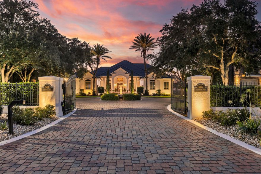 Welcome to this extraordinary two-story Mediterranean home, custom built by CD Jones on Four Mile Point in Driftwood Estates. From the moment you arrive, the atmosphere shifts--brick pavers lead you through the gated entry, past the fountain, and into a serene bayfront retreat where peace and beauty abound.  At dusk, professional lighting highlights the gardens, pool, outdoor living areas, and walkways, creating a breathtaking ambiance. By day, natural light pours through the windows, illuminating painted oak floors and a travertine entryway. In the kitchen and entertainment area, Venato Quartzite countertops reflect the sunshine continuing the fresh, timeless aesthetic. A 2020 upgrade in the kitchen includes a Wolf range top and sub zero refrigerator making cooking enjoyable and entertaining effortless.  This home is designed to embrace its surroundings -glorious sunsets over the Choctawhatchee Bay, dolphins leaping, pelicans diving, and even the occasional passing manatee family. Multiple spaces invite you to relax: a secret courtyard perfect for private conversations, the lanai and pool overlooking the bay, or the game room with a 180-degree view of the water, ideal for gathering with friends and family. The outdoor kitchen in the lanai makes alfresco dining a breeze.  Multiple upgrades since 2020 and most recently a new roof in 2025.  The new boat dock offers direct access to the bay -launch your boat for deep-sea fishing in the Gulf of Mexico or enjoy a leisurely cruise across the bay.  This property isn't just a home -it's an unparalleled lifestyle of beauty, peace, and bayfront living. Full list of upgrades and improvements available in the documents section.  Piano and Pool table will convey with property.