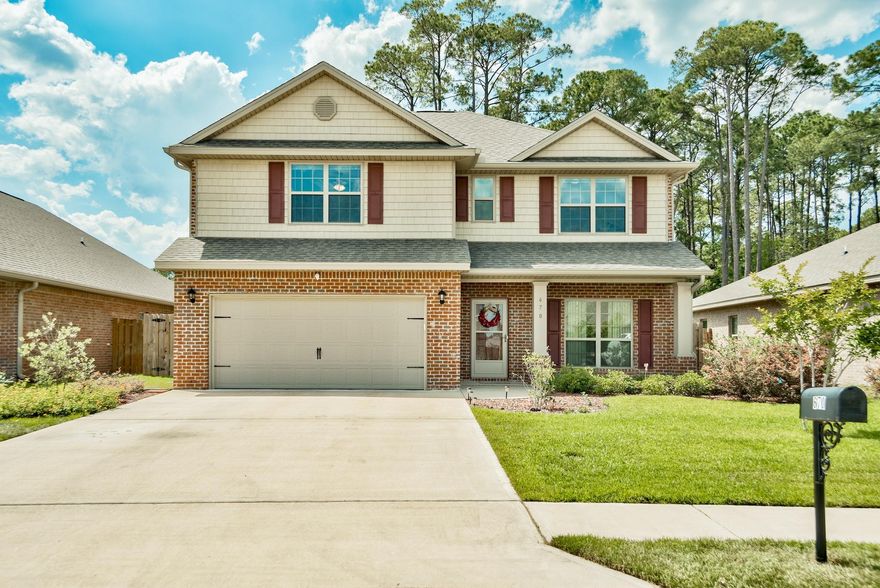 All the space you need! This large 2,569 sq ft home features 4 bedrooms, 3 full bathrooms, a half bath, and an enormous bonus room. As you walk through the front door you will notice excellent design and fine details create a beautiful home with limitless flexibility. The kitchen features granite counter tops and stainless steel appliances. As you continue through the first floor you will find a spacious master bedroom suite that features his and her walk in closets and an en suite with a tile shower and double vanities. As you head upstairs you will find 3 large bedrooms with an over-sized bonus room perfect for a game room or for entertaining guests!