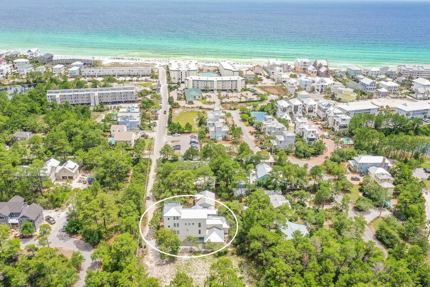 Located South of 30A with notable updates, this secluded luxurious residence with carriage house and private pool area is only footsteps away from the beach. Sold fully furnished, this renovated turn-key home is situated on an .27 lot with 5,771 square feet of living space spread over four floors with expansive outdoor living spaces perfect for entertaining. The first floor has an oversized living + sleep space with wet bar that opens directly to the custom pool area, in addition to a bathroom and laundry/mudroom with built-in storage. The second floor has an open concept kitchen, living, and dining area with separate kids area and powder bath. The gourmet kitchen has been fully remodeled with notable features including professional grade appliances, porcelain subway tile backsplash, dual