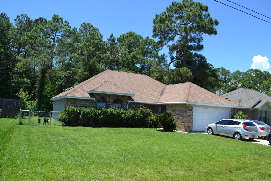 Fantastic 3 bedroom/2 bath home. Extremely close to the back gate of Hulburt. Home features fresh paint inside and out, new flooring, and new appliances. Eat in kitchen and a huge laundry room. Large master bedroom with full bathroom and a walk in closet is sure to impress. Home is mostly brick with a newer roof. 2 car garage with a huge back yard! Home backs up to the reservation, so no backyard neighbors.