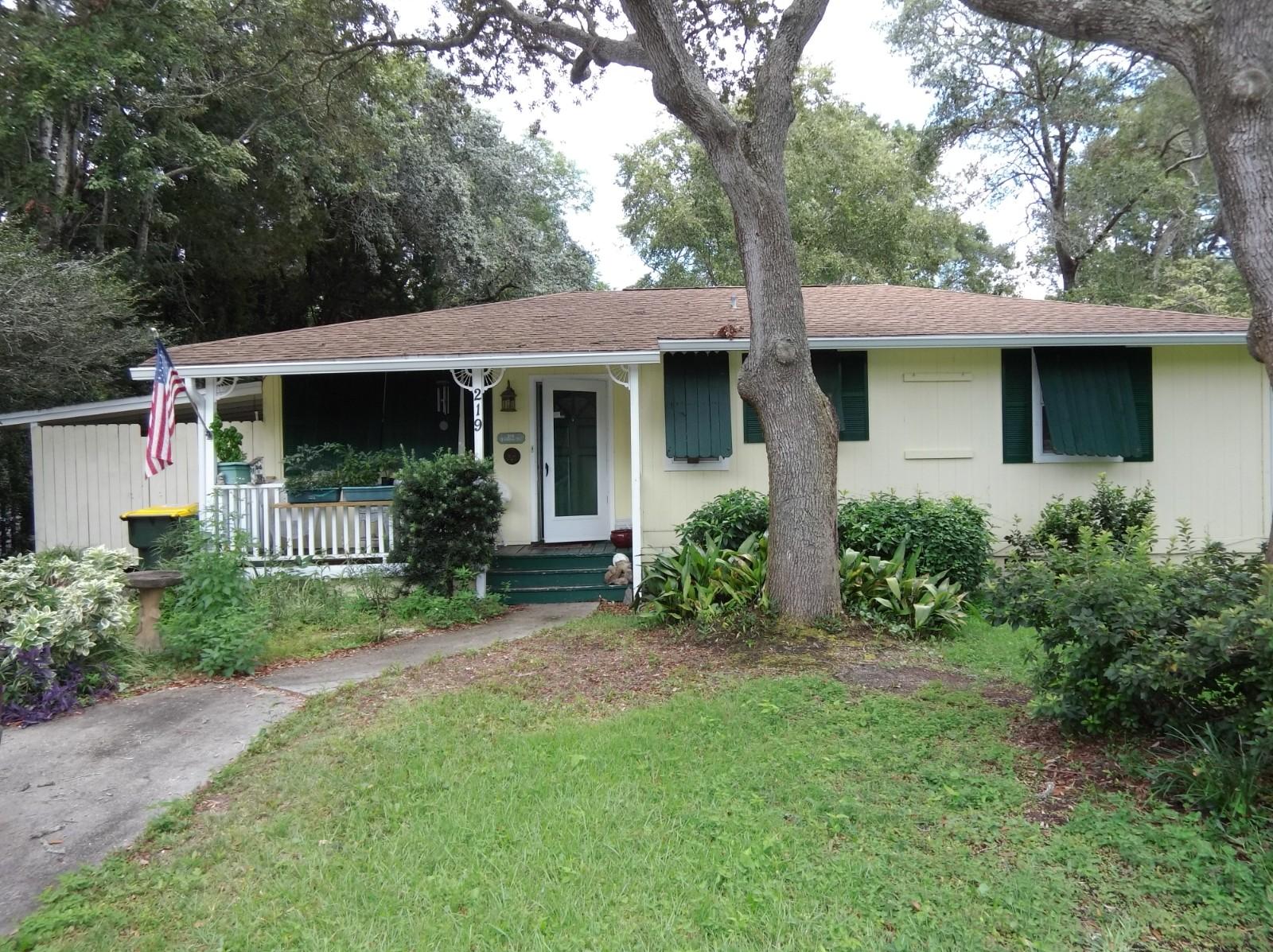 Nice cottage style home with a spacious lot. Deck over looking the back yard. A studio/workshop is attached to garage