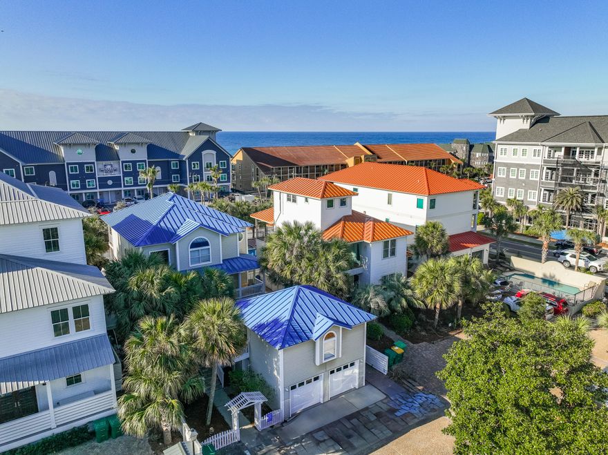 Coastal Retreat With Separate Carriage House Near Beach And Amenities: Steps from the sugar-white sands of the gulf, Ocean Breezes is a beautifully appointed coastal retreat one home from the beach in the exclusive Crystal Beach neighborhood of Destin. This stunning five-bedroom, four-and-a-half-bathroom home, complete with a private heated pool and separate carriage house, offers an exceptional opportunity for a second home or a high-performing vacation rental. With breathtaking gulf views from both balconies and just a block from public beach access, this home provides the perfect combination of luxury, convenience and relaxation. Designed for comfort and space, Ocean Breezes accommodates up to 17 guests, featuring two king suites, two queen bedrooms and a bunk room with twin and full-sized beds. The private carriage house offers additional privacy with its own living area and fully equipped kitchen, making it ideal for guests or rental flexibility. The main house boasts an updated kitchen with stainless steel appliances, granite countertops and an open-concept layout perfect for entertaining. Outside, the private pool and grill area create an inviting space to unwind after a day at the beach. With its prime location just two houses from The Henderson Beach Resort and a short stroll to dining and shopping, Ocean Breezes is a rare find in Crystal Beach. Whether seeking a personal getaway or an investment in one of Destin's most sought-after communities, this home presents an incredible opportunity to own a piece of the Emerald Coast.