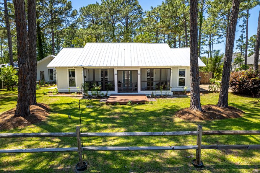 IMPROVED PRICE -Coastal Cottage with Private Saltwater Pool & Guest House -Tucked away on a spacious corner lot, this charming coastal property offers the perfect blend of privacy, flexibility, and Florida charm... just minutes from the white sand beaches of 30A. Featuring a 2BR/2BA main home plus a detached 1BR/1BA guest cottage, this unique setup is ideal for multi-generational living, rental income, or hosting guests in style.Step inside the main home and you're greeted with an open floor plan with custom finishes throughout, including warm wood flooring and beautiful Douglas fir trim. The updated kitchen offers plenty of cabinet space, quartz countertops, and a large center island...perfect for gathering with friends and family. A  staircase  leads to a cozy loft, providing the perfect flex space for an office, playroom, or additional sleeping area.
Out back, your private outdoor oasis awaits - complete with a sparkling saltwater pool, expansive patio, and lush tree-lined surroundings. Whether you're hosting a summer cookout or enjoying a quiet morning swim, this space is designed for relaxation.

The fully furnished guest cottage is equally charming.  It's a turnkey opportunity for extra income, a private space for visitors or in-law suite.

Additional highlights include:
-  Screened front porch
-  Oversized driveway with ample parking
-  No HOA

Situated just north of Highway 98, this property offers easy access to the pristine beaches of South Walton, top-rated schools, and a variety of shopping and dining options. Whether you're seeking a peaceful primary residence, a vacation getaway, or an investment opportunity, this unique home caters to all.

Don't miss the chance to own this exceptional property in the heart of Santa Rosa Beach. Schedule your private showing today!
