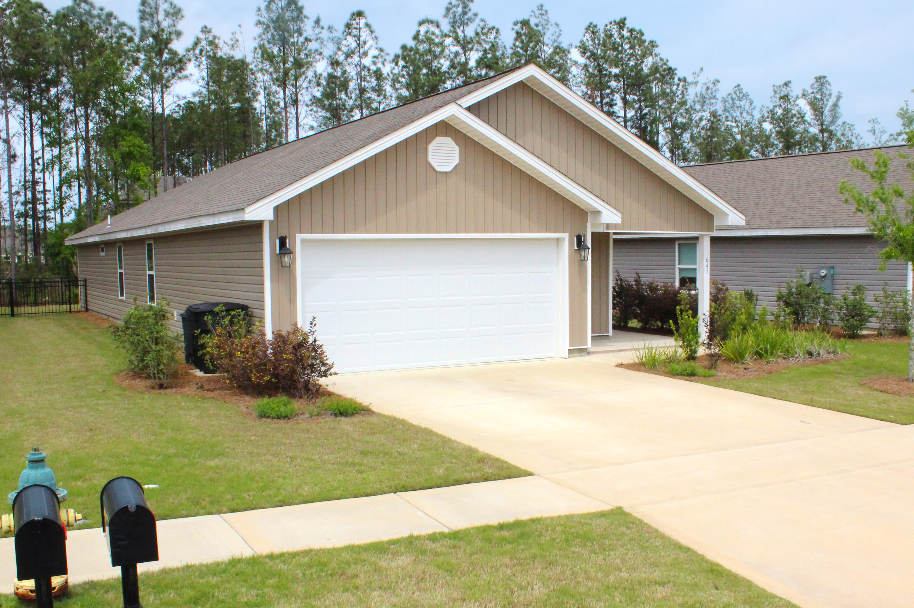 BEST PRICED HOME IN HAMMOCK BAY! Built in 2019 and practically brand new. This wonderful Jemison floor plan offers 3 bedrooms, 2 baths, over 1600 square feet, 2 car garage with room for storage and a true open kitchen/living floor plan. Perfect for young families, singles, or someone looking to downsize. Kitchen features an island that easily sits 3 people, stainless steel appliances, pantry and plenty of cabinets for all your cooking needs. The living area has double french doors that lead out to a relaxing screened in back porch. Great area to enjoy your morning coffee, unwind or entertain family and friends. The well manicured yard is perfect for children and pets to safely play and even gardening. The large master bedroom is located in the back of the home off of the living room