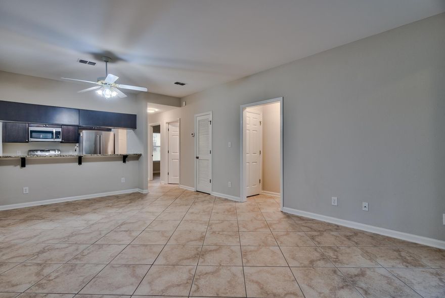 Welcome to Pointe of View, located within walking distance to the Grand Boulevard Shopping Center and the Sandestin Resort! This 1st floor, gym and pool side unit has been fully renovated and is the nicest unit in the complex. In the last several years the unit has been completed updated to include granite counters in the kitchen, all new cabinetry, stainless steel appliances, updated sinks and faucets, tile throughout, cultured marble bathroom counters and stunning master shower, fully repainted, new blinds, new toilets, screened-in porch and new HVAC and water heater. The Grand Boulevard Shopping Center is a 5 minute walk from Pointe of View. Enjoy coffee at Starbucks, breakfast at Another Broken Egg, pizza at Grimaldi's, steak at Flemings, Italian at Emeril's, Mexican at Cantina Laredo,