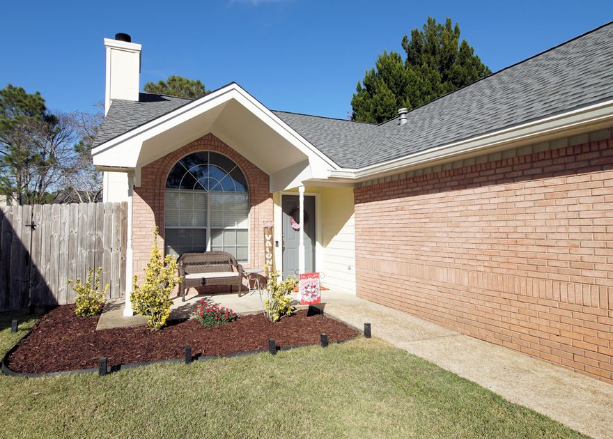 Gorgeous home with 3 bedrooms and 2 baths and 1156 sq ft located in the Lake Charleston subdivision! This home offers a new 30-year dimensional shingle roof, HVAC and hot water heater (2021). Relax on the open deck overlooking the lake and large, fenced back yard!  Enter the home into the living room with 12 ft ceilings, a wood burning fireplace, and a large picturesque window with transom! In addition, the living room features a niche for the flat screen TV and a decorative niche shelf for ornamental items! The home features an open floor plan with the kitchen and dining room opening to the living room! The kitchen has cabinetry with crown, black stainless appliances, brushed nickel hardware, and granite countertops with granite backsplash.  The appliances include a built-in microwave,