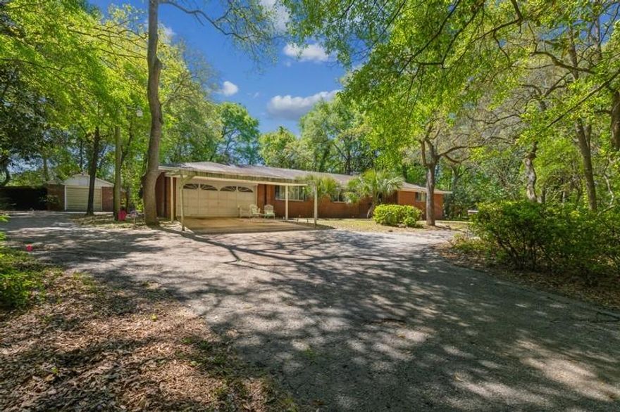 Mid century modern classic with a wetland eco habitat showcasing Floridas diverse flora and fona. You will be overlooking your very own preserve. Located in the heart of Niceville only two minutes to Niceville High School and 10 minutes to the Eglin Air Force Base gate. This location gives you all the privacy you desire while keeping you close to shopping, work, and the beach.  This all brick home is vintage and is looking for new owners to reinvent the space, with 4 large bedrooms and 3 full baths, an extensive versatile living space, and additional office space. With a two car attached garage and additional one car garage with workshop this timeless classic is ready for its new owners.