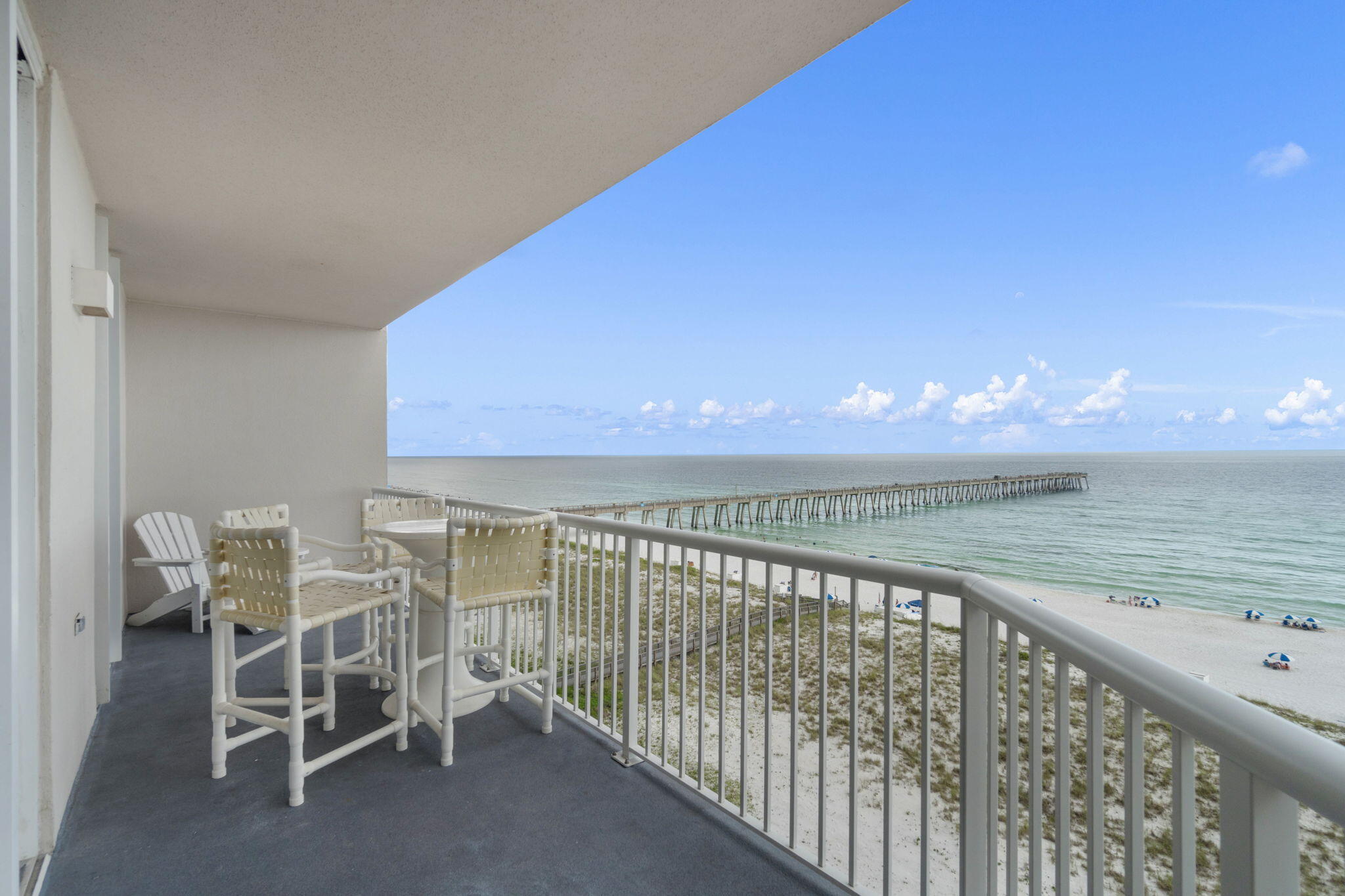 Step into paradise with this exquisite Gulf front condo, designed for ultimate relaxation and luxury. This stunning property features beautiful tile flooring that is easy to clean and perfect for sandy feet, elegant crown molding, and trey ceilings that add a touch of sophistication. Imagine waking up to breathtaking Gulf front views every day, and enjoying your morning coffee or sunset cocktails on the 25 ft balcony overlooking the pristine beach and crystal clear turquoise waters. Inside, you'll find relaxing coastal colors and tasteful furnishings sleeping 11. Living room opens to a panoramic direct Gulf view of the stunning Navarre Beach all from private unit balcony. Master bedroom is a true oasis with Gulf views and balcony access to relax to the sounds of waves while you slumber. Attractive bonus features include 25 foot balcony with direct views of the beach and Gulf, new HVAC unit (2023), stunning wood look tile flooring in all bedrooms, new refrigerator, crown molding and trey ceilings, a full size laundry room, and walk in closets.
Combine all the perfect unit amenities with a sought after complex with features that make the vacation beach experience one to remember. 450 feet of white sands and blue waters, three inground pools with one being heated in the winter months, three hot tubs, grilling areas, pavilions, showers, gym, covered parking, and private beach walkover! Summerwind West even has a dedicated store for all your vacation and trip needs!
This is the condo ownership you have been dreaming of, make your next stay the one in your own gorgeous beach front condo!
