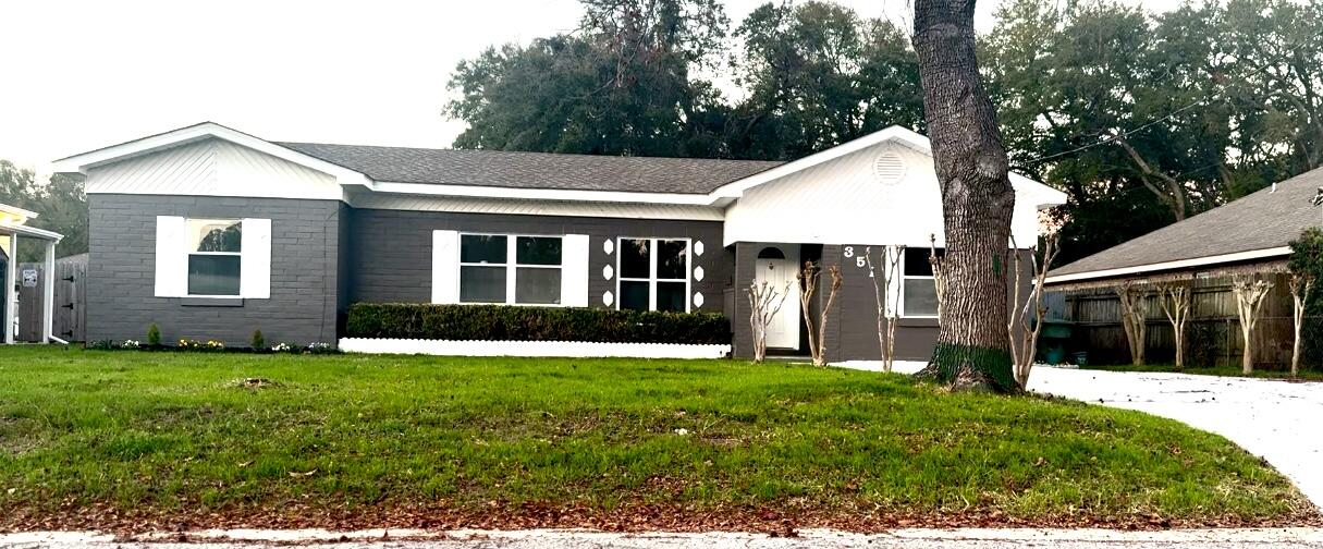 ADU 400 SQFT!!! EXTRA RENTAL INCOME OPPORTUNITY! Seller offering $5,000 to closing cost with asking price. Welcome to this charming home, situated in a peaceful, family-friendly neighborhood where community and tranquility come together. One of its standout features is the fully equipped mother-in-law suite, complete with a private entrance. This home offers a private patio to enjoy with loved ones, along with a spacious backyard to customize with preferred features. This home is located in a desirable area which is convenientlyminutes away to the bay and a short drive to the beach. Less than a 15 MIN drive to Destin. This home has all updated electrical, both water heaters brand new. 2022 Roof along with HVAC 2022. Come see this recently renovated home for yourself today!