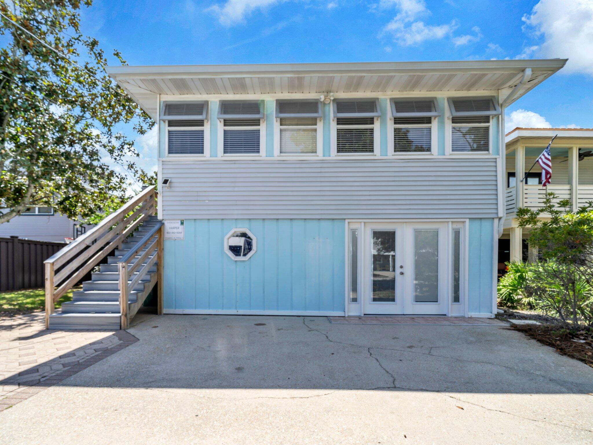 Welcome to 92 Tarpon Street - a beautifully maintained and inviting home that blends comfort, charm, and coastal living. This stunning 4 bedroom and 4 bathroom property offers spacious living areas, a modern kitchen with updated appliances, and light-filled rooms throughout. Whether you're enjoying the light filled sunroom, relaxing in the private backyard, or entertaining guests in the open-concept living space, this home provides the perfect backdrop for everyday living or vacation getaways. Ideally situated in the desirable Crystal Beach neighborhood, just TWO blocks from the beach, close to shops, and local dining, 92 Tarpon St is a rare find that combines lifestyle and location!