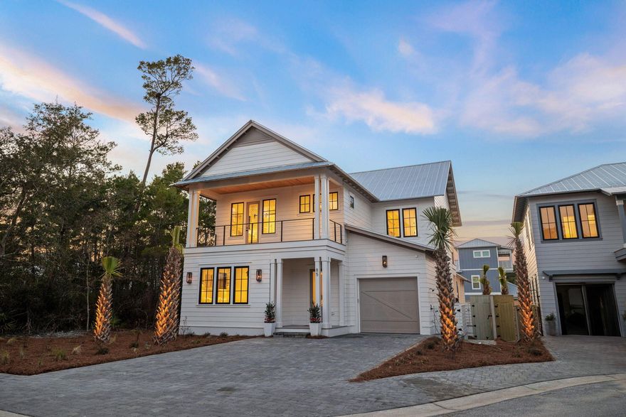 Discover coastal elegance in the prestigious Lakeside community of Inlet Beach at 85 Pine Cone Trail. This newly constructed residence by Focus Construction epitomizes luxury with high-end finishes and meticulously designed spaces. Step through the doors to find a home where comfort meets sophistication. High ceilings and abundant windows in the living areas forge a bright and airy atmosphere, accentuated by the rich tones of cypress wood ceilings and premium hardwood flooring.The state-of-the-art kitchen will thrill any culinary enthusiast with its Thermador appliances, bespoke cabinetry, and chic black hardware. Perfect for hosting, the home features an exquisite pool cabana complete with a BBQ grill, a cozy fireplace, a television, a wine fridge, and an ice maker--ideal for