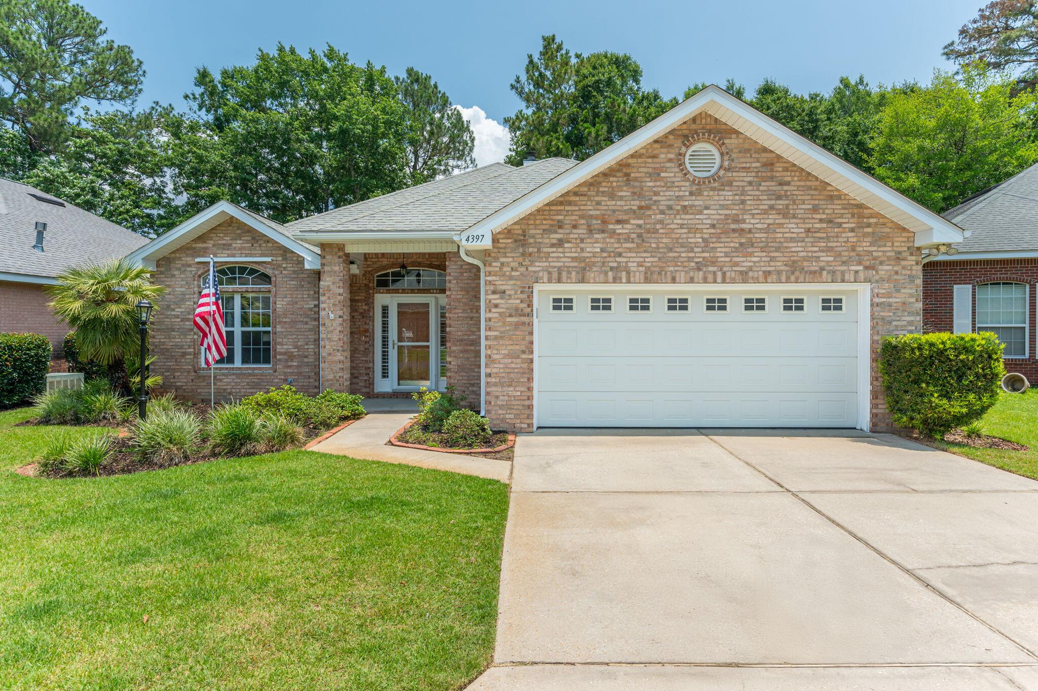 Come see this beautiful, low maintenance brick home in the heart of Bluewater Bay! The eat-in kitchen has level 4 granite and stainless steel appliances that include a top of the line gas burner stove, microwave/ convection oven and refrigerator. The open floor plan offers a dining area adjacent to the kitchen and it also flows into the great room which has a gas fireplace and built-in cabinetry as well as crown molding and real wood floors. The primary bedroom features an ensuite bath with separate shower and a walk-in closet. A heated and cooled Florida room overlooks the fully fenced backyard with fire pit for your enjoyment. Schedule your showing today!