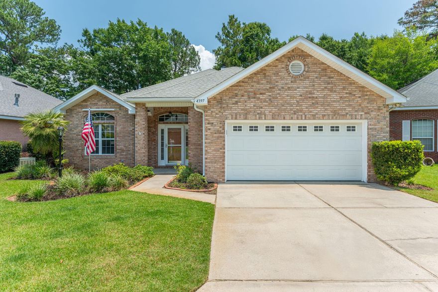 Come see this beautiful, low maintenance brick home in the heart of Bluewater Bay! The eat-in kitchen has  level 4 granite and  stainless steel appliances that include a top of the line gas burner stove, microwave/ convection oven and refrigerator. The open floor plan offers a dining area adjacent to the kitchen and it also flows into the great room which has a gas fireplace and built-in cabinetry as well as crown molding and real wood floors. The primary bedroom features an ensuite bath with separate shower and a walk-in closet. A heated and cooled Florida room overlooks the fully fenced backyard with fire pit for your enjoyment. Schedule your showing today!