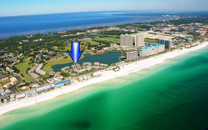 PROFESSIONALLY DECORATED, TOTALLY UPDATED, 2ND HOME, NON-RENTAL, GENTLY LIVED IN, with 2 walk-in showers, granite counter tops, tile floors through out, double screened in porch overlooking Stewart Lake, furnished, approximately 575' to Whale's Tail and over 2000 FEET of BEACH, located in Seascape Resort 18 hole golf course, clay tennis courts w/pro shop, pool(s), conference center, and GATED COMMUNITY.