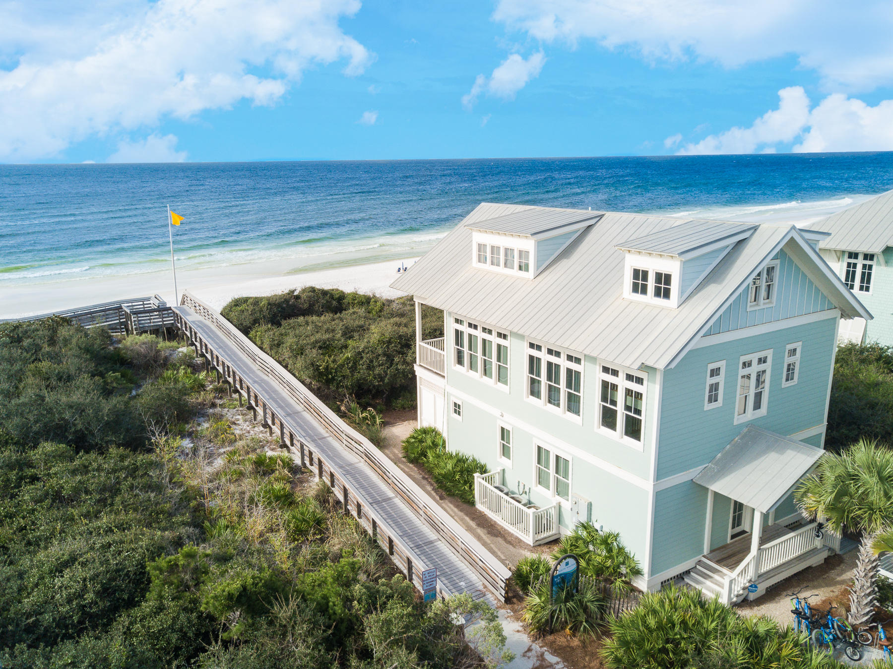 A rare opportunity to own a truly gulf front home along Watercolor's exclusive Beach Ln. One of only 6 gulf front lots extending to the waterline in Watercolor, this home also borders Seaside to the east, making it's location unsurpassed for amenities, shopping, and dining. The chic interior is perfectly blended with coastal whites throughout the home. Spacious decking on all levels allow the owner and guest to enjoy the view from multiple locations outside, while the expanse of windows maintains the view from the interior and fills the home with an abundance of natural light. The amenities of this home are vast. Sitting adjacent to Beach Ln is immediate access to the condo pool and beach boardwalk. Just on the other side you will find the Watercolor Beach Club with it's expansive pool