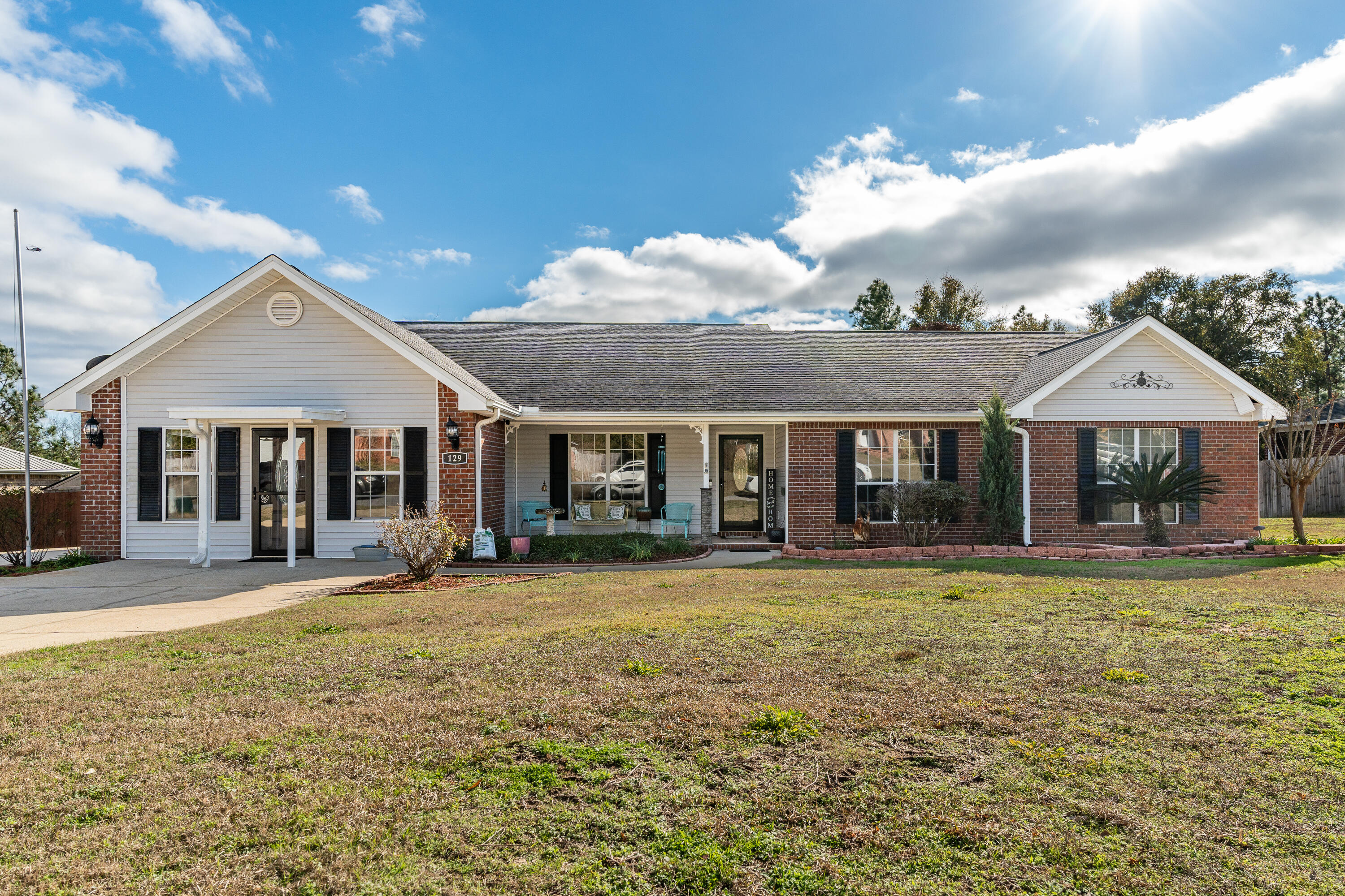 Seller is offering up to $5,000 anyway money AND the opportunity to ASSUME 3.125% INTEREST RATE!  Discover the perfect blend of elegance and comfort in this stunning home! The open floor plan boasts two distinct living areas, high ceilings, & exquisite crown molding with eye-catching stone columns. LVP & tile floors flow throughout, with carpet reserved for secondary bedrooms only. The heart of the home features a gourmet kitchen with granite countertops, complemented by a formal dining area with French doors & a separate eat-in area in the kitchen. The spacious primary suite offers a luxurious retreat with no carpet, two walk-in closets (one transformed into a custom dressing area), & a spa-like bath complete with a tiled walk-in shower, a separate soaking tub, & dual sink granite vanity Updated guest bathrooms shine with shiplap walls and granite countertops. Step into relaxation in the Florida sunroom or the backyard oasis featuring a saltwater pool, a firepit, and an outdoor kitchen equipped with granite counters, a sink, and a Green Egg, mini fridge, and Blackstone. The clubhouse adds versatility, currently utilized for storage. This home offers unparalleled living with exceptional finishesdon't miss your chance to make it yours!