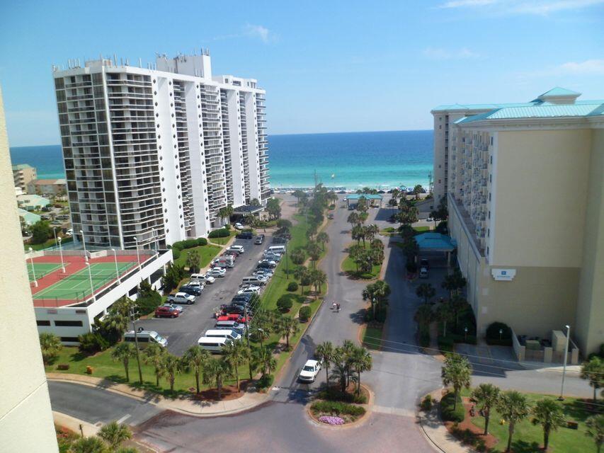 Two bedroom, two bath condo excellent view of the Gulf. The kitchen with granite is white, light & bright. . The neutral interior is nicely furnished & accessorized. The master bedroom opens to the balcony along with the living area. There is a stackable washer & dryer. for added extra convenience. Ariel Dunes offers: 2000 feet of deeded white sand beach, large zero entry pool, the Cabana Cafe, golf, tennis, fitness room, & a conference center all located in the gated Seascape resort. Conveniently located to shopping, restaurants, & everything you could want or need.