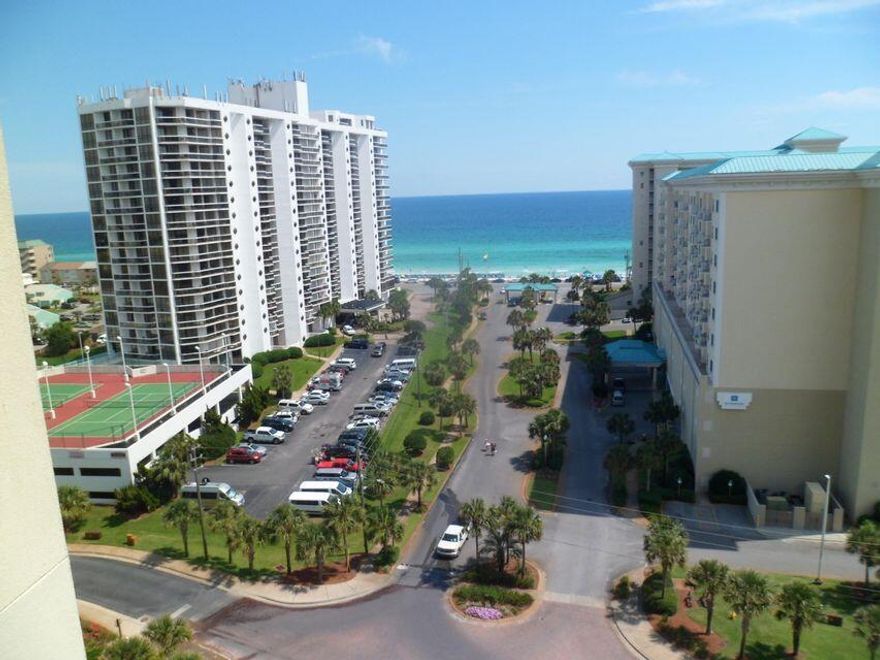 Two bedroom, two bath condo excellent view of the Gulf. The kitchen with granite is white, light & bright. . The neutral interior is nicely furnished & accessorized. The master bedroom opens to the balcony along with the living area. There is a stackable washer & dryer. for added extra convenience. Ariel Dunes offers: 2000 feet of deeded white sand beach, large zero entry pool, the Cabana Cafe, golf, tennis, fitness room, & a conference center all located in the gated Seascape resort. Conveniently located to shopping, restaurants, & everything you could want or need.