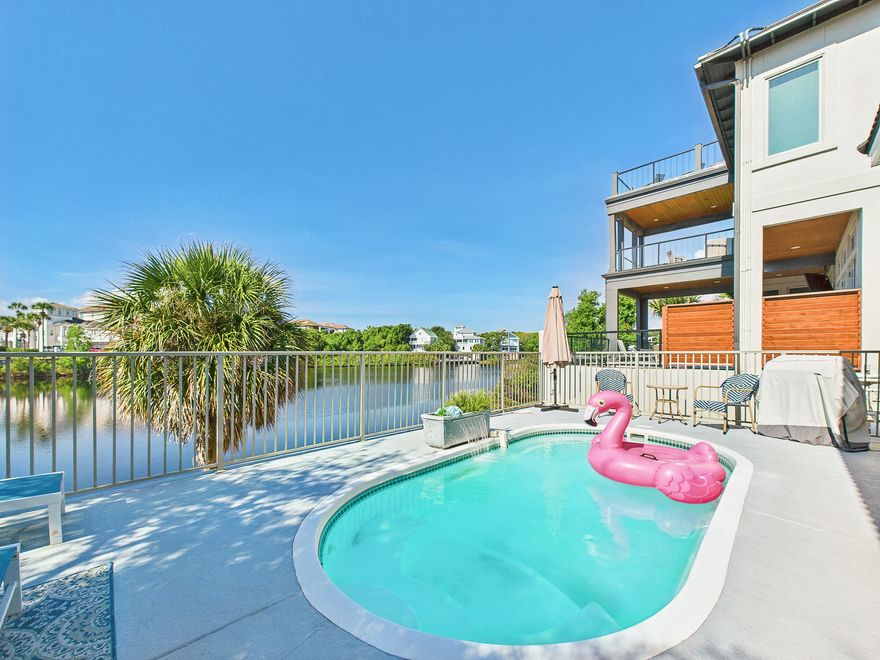 Welcome to a majestic 2674 sq. ft. three-story beach house perfectly nestled within Destin's premium beachside locale, just off the Scenic Highway 98. This exquisite lakefront retreat tucked inside the exclusive, gated community of Destiny effortlessly blends luxury living, vacation charm, and immense investment potential.Boasting the capacity to comfortably accommodate up to 15 guests, this beach house is an immaculate gem. The first floor contains a grand primary suite, complete with a king-sized bed, a charming twin daybed, a spa-styled bath, plus direct access to the private saltwater pool. Enjoy the airy open-plan living room with a fireplace and built-in shelves. The chef's kitchen is a culinary dream accentuated by the shining granite counters and stainless steel .... stainless-steel appliances. 
Ascend to the second floor to discover a comfortable bunk alcove, two spacious bedrooms, one furnished with a king-sized bed and the other featuring two queen beds, interlinked by a convenient Jack & Jill bath. 
The uppermost floor reveals an enchanting loft housing twin daybeds and captivating lake and gulf views. Herein, you'll also find a handy kitchenette perfect for quiet, intimate moments. 

Outdoors, indulge in your private above ground pool terrace overlooking the lake or spoil yourself with Destiny's resort amenities: the lagoon, hot tub, tennis courts, fitness center, and clubhouse. All these are directly opposite the picturesque James Lee Park beach access, known for its pristine white sands and calming emerald green waters. 
Recent upgrades include:
2 new HVAC units installed Mar 25 with warranty included
Roof replaced in 2017 with top grade metal tile materials, and W/H 2019.
2nd floor has new carpeting and stairs are now wood
Newly renovated kitchen with all new cabinetry, stainless steel appliances, granite counters, and detailed lighting
Recently installed wood look tile floors throughout the main living level
Newly remodeled master bathroom with beautifully tiled walk-in shower, separate soaking tub and double vanities plus a HUGE walk-in closet
New full bath addition on main level with beautiful tiled walk-in shower. 
Added perks include extra-large closets in the primary bedroom and a spacious walk-in closet in the primary bath. This property also comes fully furnished and ready for immediate enjoyment or high-yield rental income potential. 

Schedule a showing or contact us today for more information on this irresistible lakefront retreat. Your dream home patiently awaits at 4634 Sunset Pointe!