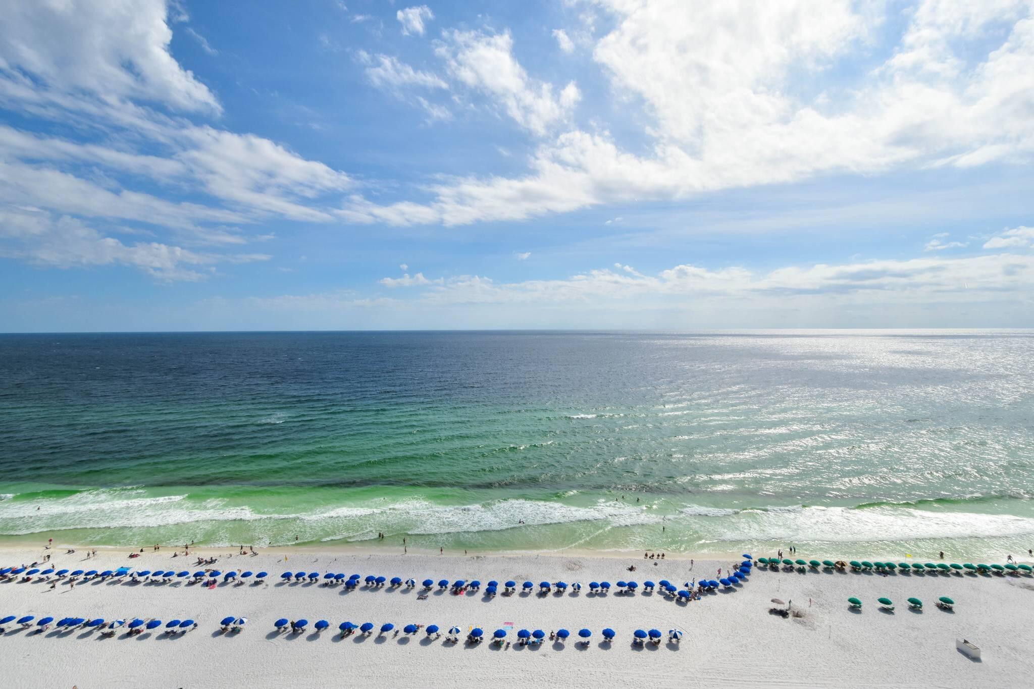 A rare find! Live your life luxuriously high above the shores of the Gulf of Mexico at the exclusive Silver Beach Towers. This incredible two-story seventeenth-floor penthouse was finished with quality materials offering luxury and some of the best views in the area. Upon entering the lavish home, you are immediately greeted by opulence as you wander through the foyer towards the well-designed five-bedroom entertainer's floor plan, fit for a busy everyday lifestyle, special occasions, and all the small moments in between. The space is filled with warm Floridian sunshine, panoramic views of sandy beaches below, and true quality craftsmanship that will leave you breathless at every turn leading you toward the heart of the home - the kitchen.