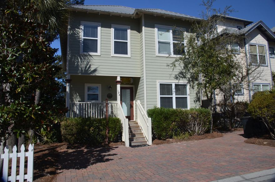 LAKEVIEWS. JUST REDUCED $20,000. Perfect 4 bedroom and 3 bathroom home backs up to a conservation easement and a beautiful Lake. Enjoy views of the lake from the master bedroom and the adjoining deck. This home features open floor plan with lots of windows and natural light,tiled floors on first floor, one bedroom on the first floor, backyard deck, golf cart garage and more.Located across from the community Pool makes access easy and its almost like having a pool in your own yard. The Beach, Gulf Place, Grayton Beach and Seaside, all located close by to enjoy the 30A life. Buyer to verify all information to buyers satisfaction including but not limited to sq. footage, room sizes, lot size, zoning etc.