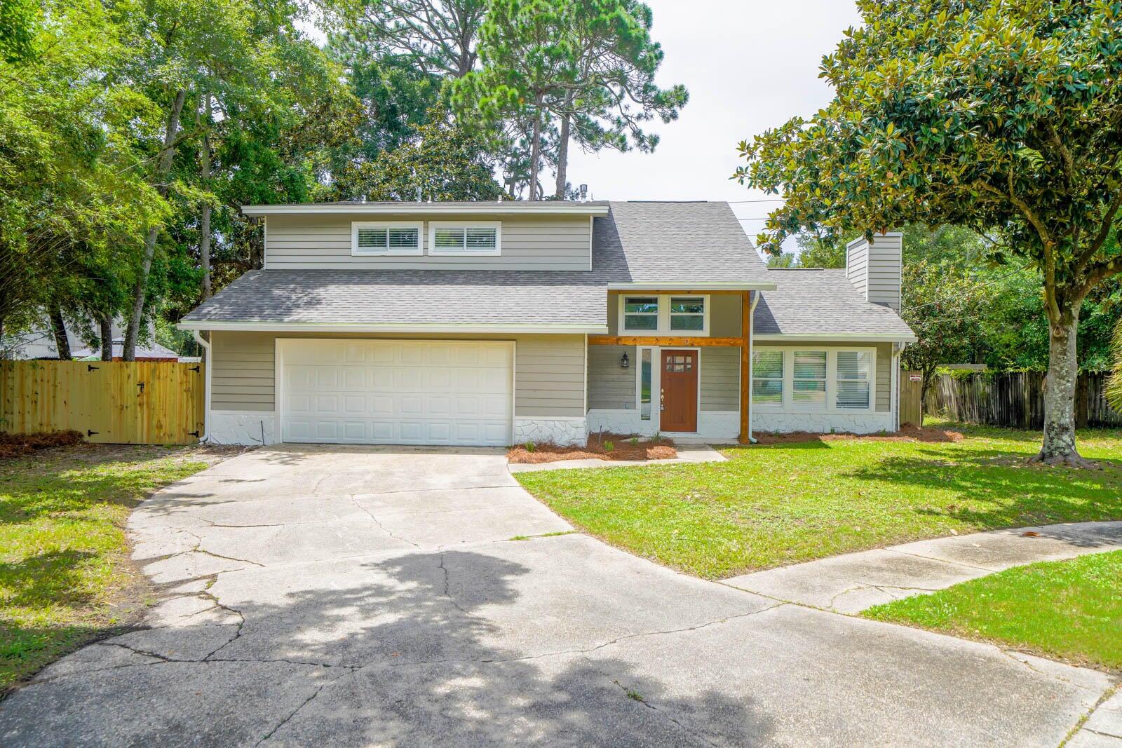 *Room to Park your Boat* *PETS Accepted case-by-case*. 4 Bedrooms PLUS a 2nd Floor Den! Close by to HURLBURT FIELD, Eglin AFB, Duke Field, 7th Grp, Navarre Beach, Destin, area hospitals and more. Charming features like shiplap accents, exposed beams, a wood burning fireplace, fenced yard.  Minutes from popular areas such as food trucks + entertainment in Downtown Fort Walton, Uptown Station, and the famous Nightlife of Okaloosa Island. Nearby to the 'Most Beautiful Beaches' with numerous public beach accesses. Less than 1/2 mile from the water, your feet could be on the sugar white sand in as little as 10 minutes! FULLY REMODELED - new fixtures, paint, flooring, bathrooms, counter tops, cabinets and High-End Stainless Steel appliances. Proximity to shopping such as Target, Publix, Lowe's.