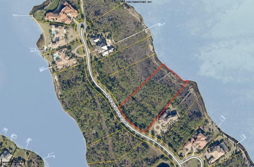 REO property. 2.63 acre estate size lot with 222 feet of water frontage located inside Destin's premier gated Freddie Couples designed golf course Kelly Plantation at Waterford. Community amenities include tennis courts, community pool, clubhouse with dining, nature trails and so much more. Quarterly HOA fees are $645.00 along with a $230.00 maintenance fee for this very desirable neighborhood. Wetland assessment report in photos