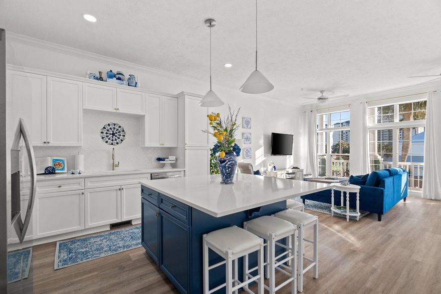 Seller will contribute $20K to buyer closing costs! Experience coastal luxury with a Hamptons twist in this fully renovated townhome, just a short stroll from PCB's world-famous white sand beaches. This spacious, three-story home features an in-unit elevator for ultimate convenience. The top floor boasts a luxurious master suite with a private balcony offering Gulf views and a spa-like ensuite. The second floor features an inviting living area with abundant natural light, an updated kitchen with stainless steel appliances, and an open floor plan ideal for hosting. Relax by the pool and enjoy close proximity to all PCB has to offer! Professionally designed and sold furnished, making it a turn-key second home. Short-term rentals allowed--property generated $96K total revenue last year!