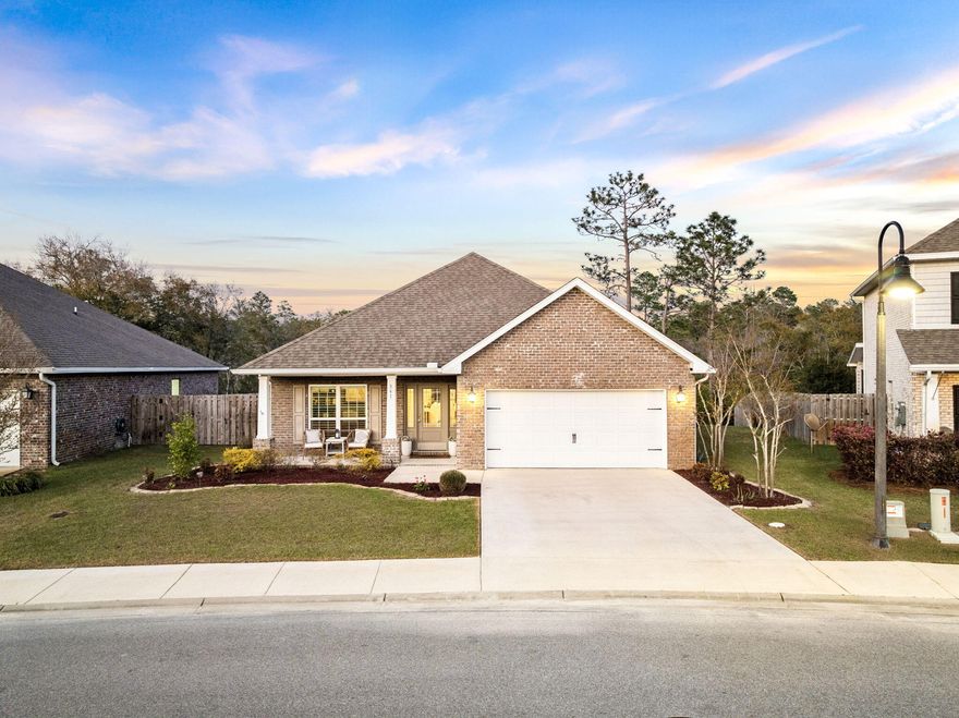 Welcome home to 341 Wayne Trail! This exceptional, one-story residence has been designed to host extraordinary living near 30A. Positioned directly on a scenic lily pond and boasting a large quarter-acre lot, this home offers privacy and fantastic outdoor living spaces. Step inside to savor the perfect floor plan with open-concept living as well as three-bedrooms plus an office. The office has been customized with built-in bookcases, gorgeous shiplap and tons of storage. The chef's kitchen features crisp white cabinets along with high-end appliances and a stunning antique pantry door. Enjoy the lovely dining space underneath rich wood beams. The living room is the heart of the home with its captivating stone fireplace, wood mantel and upscale arched built-ins. The light, airy bar showcases a beverage cooler, quartz countertops, white tile backsplash, wood shelving and additional storage. You will notice incredible details such as 5' wainscoting, plantation shutters, high-end light fixtures & unique cabinet hardware. The primary suite offers an exemplary view of the lily pond, a refreshing primary bathroom, and a spacious walk-in closet. The two guest bedrooms have been customized with stunning wall features and have roomy storage closets. Step outside to lounge on your expansive screened-in porch and walk along beautiful pavers to your substantial outdoor fire pit gathering space. 341 Wayne Trail is in close proximity to top-rated schools which include the new Dune Lakes Elementary School, Emerald Coast Middle School, and South Walton High School. Explore this sanctuary designed for relaxation, connection and unforgettable memories near Rosemary Beach and Seaside!