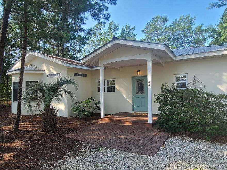 This 2bd/2ba waterfront cottage on a 1/4 acre lot is located less than 1/2 mile by boat on dredged canal to the Choctawhatchee Bay. The original home was built of reinforced concrete with metal roof, to withstand the storms. Additions and renovations have only improved the home. Emerald-green waters of the Gulf of Mexico and white sandy beaches are less than 4 miles away at Grayton Beach. The home offers a spacious living room with vaulted ceiling, allowing light to enter from 3 sides. Large open deck on back of home is great for entertaining, as is the screened porch. Bonus room can be used as additional living room or office. Launch kayaks off the back dock and paddle your way to the Bay. Bike to Grayton. Enjoy the beach lifestyle from this established neighborhood in Point Washington.
