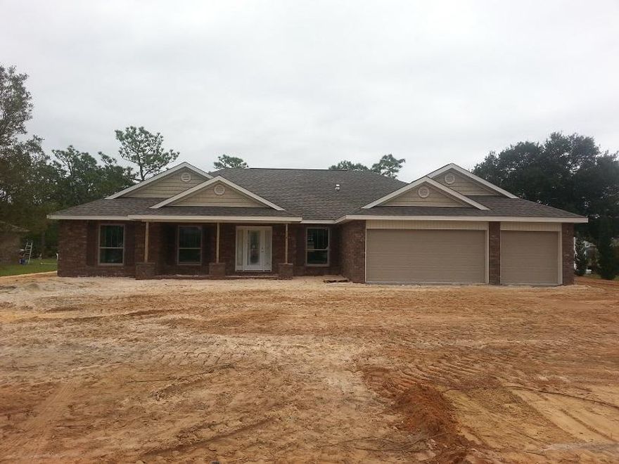 Under construction & conveniently located on 1/2 acre home site near the east entrance & 98. High ceilings in main living area creates spaciousness. Family room has triple rear windows for lots of natural light and overlooks the covered lanai and rear yard. Double doors enter you into the large master suite with tray ceiling, entrance to the lanai, and features oversize walk in shower with custom tile work and dual shower heads. The kitchen is the heart of this home, open to the family room, offers a HUGE walk in pantry, beautiful granite, kitchen island, raised panel cabinets with crown molding, over/under cabinet lighting, recessed lighting, and a set of cabinets with glass inserts & puck lighting to highlight special glassware and much more.