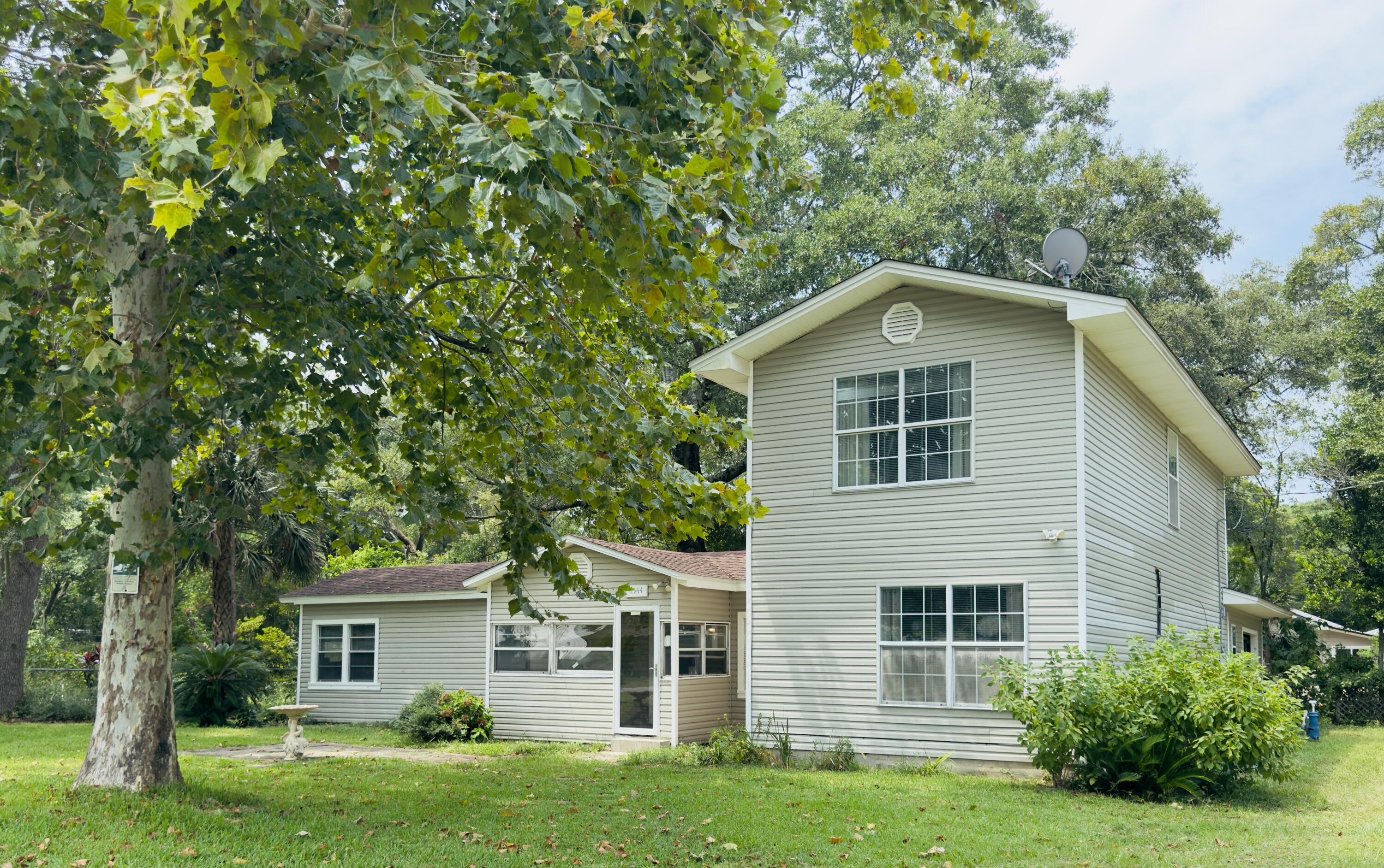 BACK ON THE MARKET due to no fault of the seller! This 3 bedroom/2 bath hybrid home has amazing potential for the right owner. Situated on a 0.41 acre lot, it is located close to some of the world's most beautiful beaches via MidBay Bridge or a quick commute to the Twin Cities Area and Eglin Air Force Base. Home incudes a 2 story addition with one car garage on a slab foundation. This home is in the perfect location with no HOA's and the flexibility to make it your own. Property is being sold AS IS.
