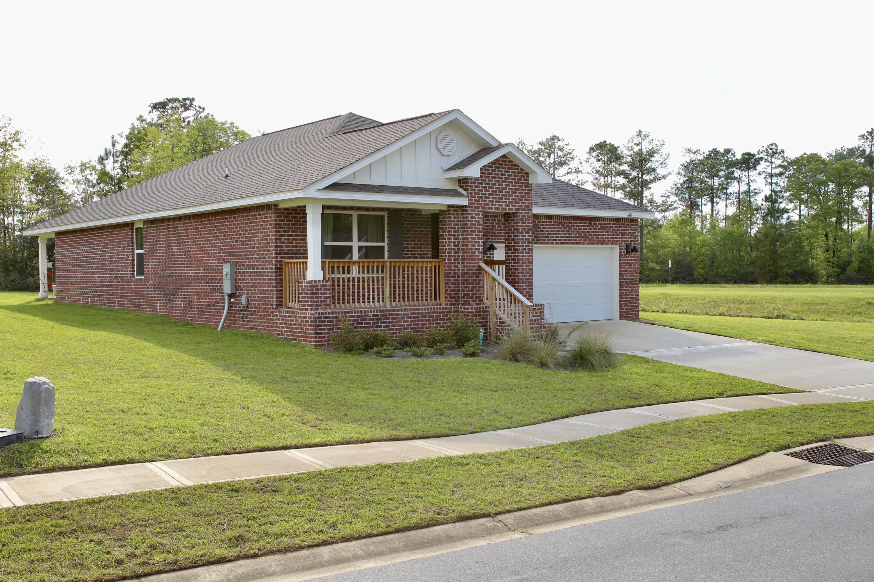 The Cali Floor Plan features 4 bedrooms and 2 full baths. The home is all brick and has a covered front porch. As you walk in the home you will find 3 beds and a full bath up front, the master is off the living room. The kitchen is open to the dining room and living room. The kitchen features granite, stainless steal appliances and a breakfast island. The floors through out the main area have wood like flooring and the bedrooms have carpet. The master bath has a shower and double vanities and a walk in closet. There is a covered patio out back and there is a tree line buffer for privacy. Schedule your tour today!