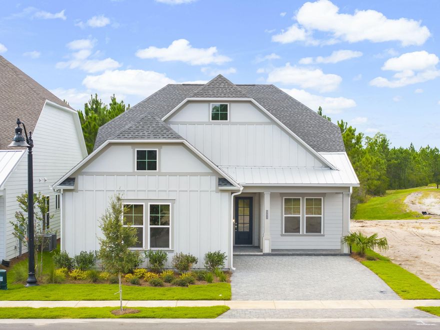 **NEW CONSTRUCTION**Located in Salt Grass at Ward Creek. Home will be available in August 2025.  Model photos used for reference. Welcome to the Lila floor plan, a Kolter Homes built home that blends modern elegance with comfort and durability.  This 4-Bedroom, 3 Bath residence features a 2-Car courtyard garage, charming front porch, and paver driveway.  Engineered to exceed current Florida Building code standards. This home includes 2x6 exterior walls, impact- resistance windows, and James Hardie sliding  for long lasting quality and peace of mind.  Inside, soaring tray ceilings create an open elevated atmosphere.  The gourmet kitchen is the heart of the home, boasting  designer selected finishes such as an expansive island, quartz countertops, brushed nickel hardware, and GE Profile appliances. The owner's suite offers a luxurious retreat, featuring a frameless walk-in shower with bult in seating. Throughout the home rich hardwood flooring adds a seamless and sophisticated touch.  Outdoors, large homesites provide ample room for personalized outdoor living.  This home also backs up to protected Florida wilderness, offering serene preserve views and exceptional privacy. Located in the sought-after Saltgrass at Ward Creek community, this home places you just minutes from all that Panama City has to offer- without the congestion. Enjoy quick access to 30A beaches, Pier Park, Top Golf, and a vibrant array of shopping and dining. Saltgrass is also positioned near exciting new developments, including the 87-acre THH?FSU Hospital, the upcoming West Bay Shopping Center with 50,000+ sq ft of retail space, a Publix, expected to open in Spring 2026. Whether you're looking for elegance, space, or an unbeatable location, the Lila delivers it all.


