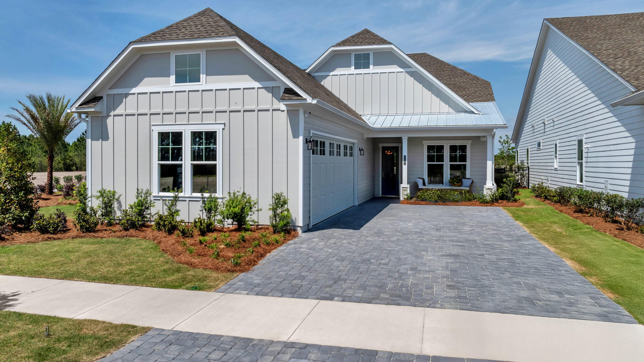 **NEW CONSTRUCTION**Located in Salt Grass at Ward Creek. Home will be available in August 2025. Model photos used for reference. Welcome to the Lila floor plan, a Kolter Homes built home that blends modern elegance with comfort and durability. This 4-Bedroom, 3 Bath residence features a 2-Car courtyard garage, charming front porch, and paver driveway. Engineered to exceed current Florida Building code standards. This home includes 2x6 exterior walls, impact- resistance windows, and James Hardie sliding for long lasting quality and peace of mind. Inside, soaring tray ceilings create an open elevated atmosphere. The gourmet kitchen is the heart of the home, boasting designer selected finishes such as an expansive island, quartz countertops, brushed nickel hardware, and GE Profile appliances. The owner's suite offers a luxurious retreat, featuring a frameless walk-in shower with bult in seating. Throughout the home rich hardwood flooring adds a seamless and sophisticated touch. Outdoors, large homesites provide ample room for personalized outdoor living. This home also backs up to protected Florida wilderness, offering serene preserve views and exceptional privacy. Located in the sought-after Saltgrass at Ward Creek community, this home places you just minutes from all that Panama City has to offer- without the congestion. Enjoy quick access to 30A beaches, Pier Park, Top Golf, and a vibrant array of shopping and dining. Saltgrass is also positioned near exciting new developments, including the 87-acre THH?FSU Hospital, the upcoming West Bay Shopping Center with 50,000+ sq ft of retail space, a Publix, expected to open in Spring 2026. Whether you're looking for elegance, space, or an unbeatable location, the Lila delivers it all.