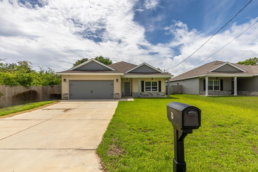 Beautiful Craftsman style home located approximately 1 mile west of Hurlburt Field! The stunning exterior features architecturally distinct gables with hardie shakes and a classic front porch. The interior is equally impressive with Vinyl plank flooring in the living area, and carpeted bedrooms. Granite countertops in kitchen and bathrooms, stainless Samsung appliances including a convection oven. The kitchen is open to the dining area and living room, allowing ample space for entertaining. 10 foot ceilings in the living room and 9 foot throughout the rest of the house give the home a light and airy feeling. Large master bath with double vanity, separate water closet and his and her clothing closets. The Front and back covered porches. Spacious back yard is fully fenced w/ a 6ft privacy