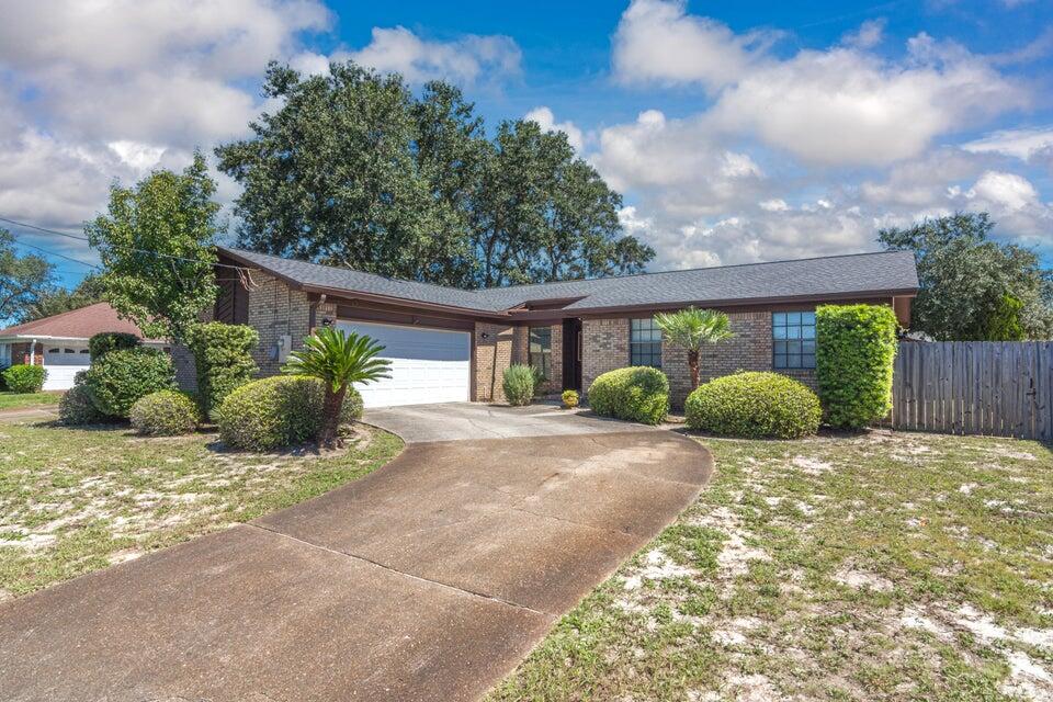 Location Location Location!!! Convenient to Hurlburt Field, shopping and beaches. This brick home has a newer roof 2020 and newer AC 2019! The sunken oversized living room has a floor to ceiling fireplace. Kitchen has stainless appliances. This home has 3 bedrooms 2 baths and a small bonus room off the kitchen with built in book shelf that would make a great library or small office. Contact office 850-936-0700 for more information.