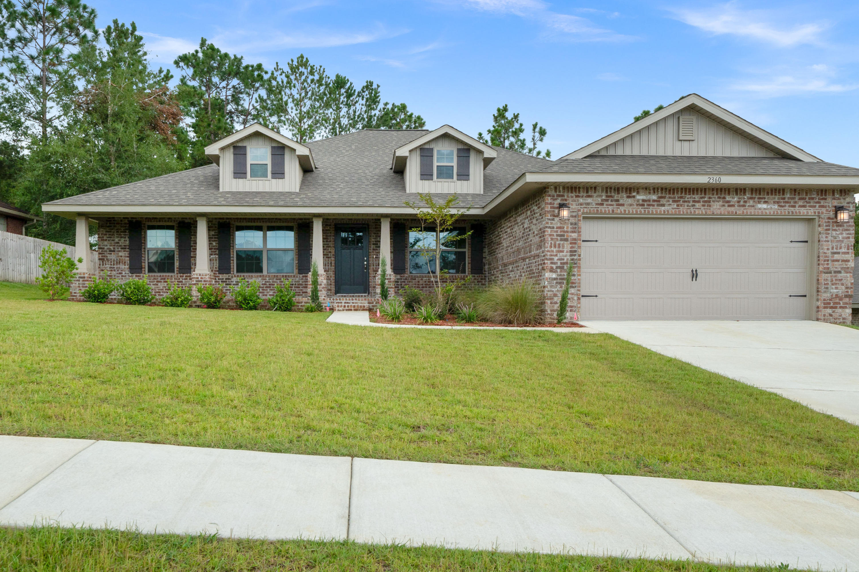 Come take a look at one of our most popular plans! This remarkable 4/2 home boasts craftsman styling in a charming neighborhood located approx 3.5 miles from Crestview High.The kitchen has custom cabinets and the flooring throughout will stand up to your dogs, children and heavy traffic. The spacious master is away from the other bedrooms and the master bath has a separate tub.shower Enjoy the benefits of county vs city taxes in an extremely desirable neighborhood. This home has to been seen to truly appreciate