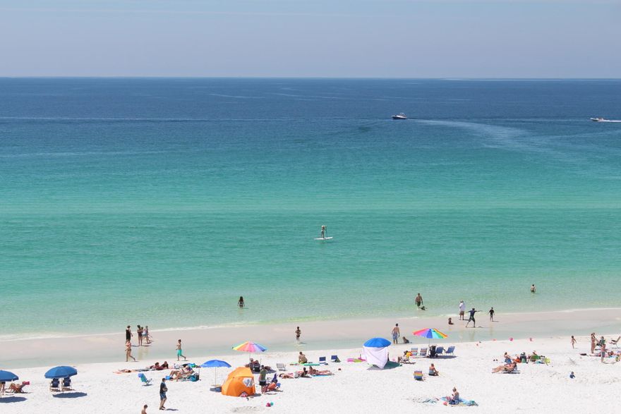 Placed perfectly on the 9th floor at the Western end of Majestic Sun, the balcony and extra windows provide expansive and endless Gulf views. Indulge yourselves (& your guests) with three seperate bedrooms and three bathrooms. The master bedroom faces the Gulf and has sliding doors going out to the balcony to enjoy your morning coffee or a night cap. The kitchen has been updated with Corian counters and Stainless Steel Appliances. BEST of ALL...this condo comes with a coveted PRIVATE covered parking space. Units on this side of the building have over $70,000 potential in gross rental income. This is a fully furnished and equipped, turnkey investment that has been booked solid. Photos to come. In the meantime, we are happy to provide the vacation booking site for a sneak peak.