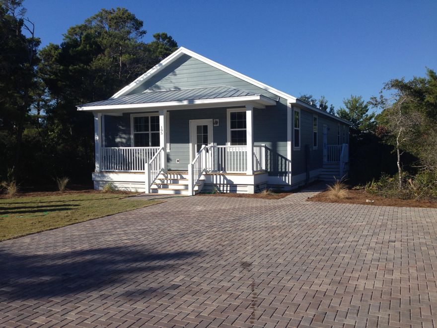 WALK TO THE BEACH! This brand new home features TWO master suites, a large island kitchen with granite counters and an upgraded appliance package, spacious dining, locally-sourced natural Cypress wood flooring, a metal roof, and a bathroom attached to each bedroom! In addition to the beach, this home is close to shopping, dinging, golf, and deep-sea fishing and would make a great primary residence or vacation rental. Property currently has no HOA fees. Tremendous short term rental projections. Management team in place if needed. Visit the below link to view the nearest public beach access the Gulf View Heights Access. https://www.youtube.com/watch?v=fh-Jz4Tx2_I
