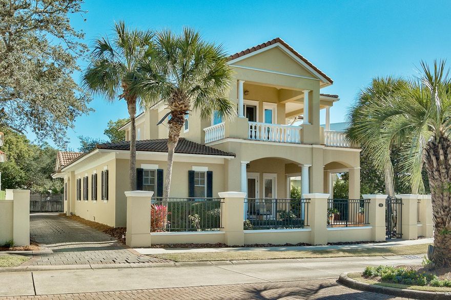 Blending the architecture of New Orleans with the colors of the Carribbean, the gated, gulf front enclave of Caribe has lush landscaping, the sugar white sands of the beach, West Indies design, and a fantastic locale between Sandestin and Destin. This Caribbean style home is located in the center of the neighborhood just steps from one of the two community pools and just over 1000 feet from the sparkling waters of the Gulf and one of two community deeded beach accesses. The property is one of the few homes with a detached garage for parking or storage that could be converted to a private carriage house. High ceilings (12')downstairs and French doors that lead to deep covered verandas are the perfect way to catch the Gulf breezes. Other features include crown molding, deep baseboards,