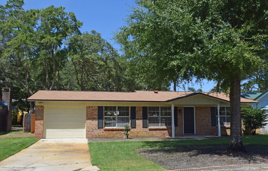Neat, petite, and ready for YOUR family! The owner has completely renovated this brick ranch so you just need to bring your family. The interior has been painted--walls, ceilings, woodwork! All lighting has been replaced--most of it with economical LED fixtures which make the interior bright and easy on the eyes. Both baths have been updated with new vanities, plumbing, lighting, and new toilets. Only the tubs remain. The kitchen cabinets are fresh and new as are the countertops, and the appliances. This step-saver kitchen will help you turn out great family meals in no time!Other info: Tile floors in the main living areas, kitchen, and baths. New carpet in the bedrooms. Fogged windows have been replaced. The roof dates from 2012, the HVAC from 2008. The front yard has been