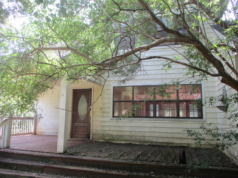 Located on 2 acres just north of Crestview High School, this 3 bedroom 2 bath REO property has tons of potential. This country home was built in 1997 and has split bedroom design, wood floors and large loft for guests, play area or office. Home is fenced for horses and comes with a large stable. Home has masonite siding, open porch on side and front and space for wood burning stove/fireplace in living room. A must see to get the full view of this property's potential. Call today. Sellers asking price is $117500