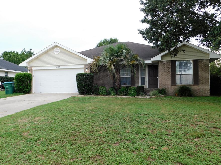 YOUR HOME! Located in South Crestview, giving access to both Hwy 85 and Hwy 90, come take a look at this 4 Bedroom 2 Bath Home. As you walk into the foyer this home gives you the new owner an opportunity to create an atmosphere where everyday is like day one. The open living area with fireplace creates a great canvas to build upon the already gorgeous bamboo floors. The kitchen which gives clear access to living room boast entertainment, conversation or just being able to watch/hear the tv. There is tile in the wet areas and the bedroom located up front. The Master bedroom with enough space for even a king size bed has a bathroom featuring double vanity and two walk in closets. Outback is a great yard that has plenty space to garden, grill or just relax. Come see this home today!