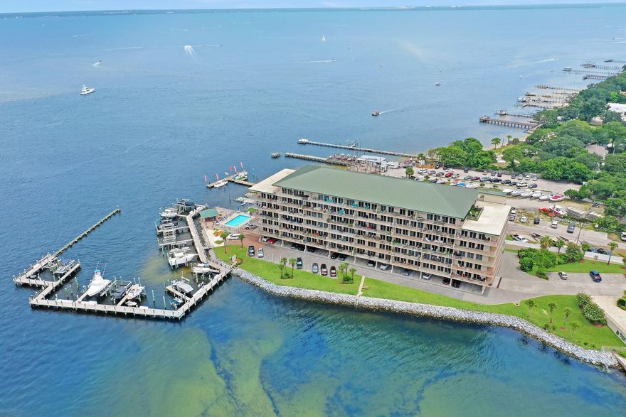 Sides Moreno Point West is a very beautiful and unique property!  Enjoy amazing  views of the Gulf, Choctawhatchee Bay, Destin Pass to the Gulf and East Pass.  Views from the balcony are awesome.  The condo has 10' ceilings, heavy duty German manufactured exterior balcony doors.  This floor plan is one of only 4 in the building that has Master Bedroom, guest bedroom and living room with gulf and east pass views.
#2 boat slip has easy access to Choctawhatchee Bay, Destin Pass to the Gulf.  Deeded boat slip #2 with lift and dock box is included.  Covered parking in garage #45. Security gates and cameras.  Only Boat slip owners have gated access to dock and slips.  Full service Marina next door, fuel island, bait, ice, boat supplies, boat ramp.  Walking distance to all Harbor attractions. and several of Destin's best restaurants.  

The construction of the building is concrete foundation, steel/concrete risers and floors, stucco exterior, metal standing seam roof, aluminum trim.